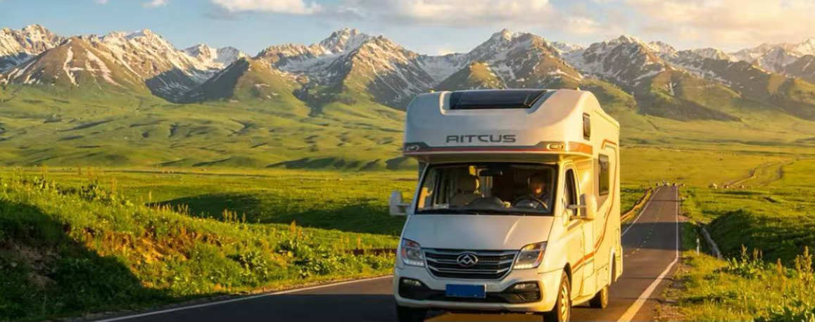 RV travelling through the mountain landscape of Xinjiang